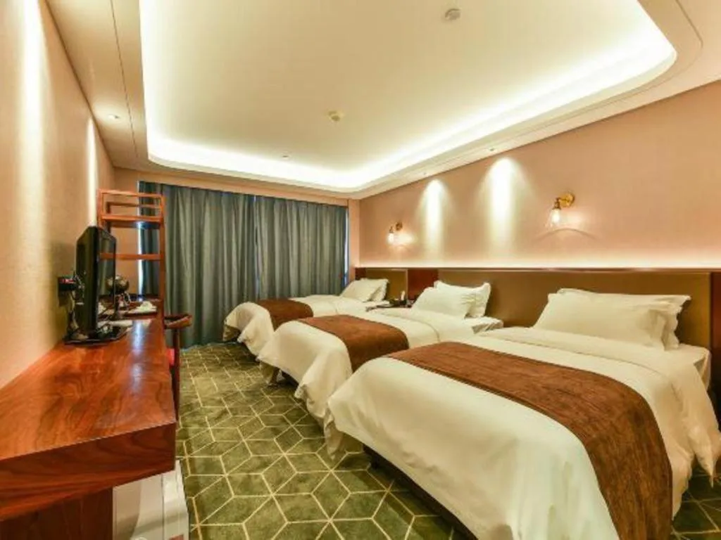Bed in Guilin Plaza Hotel