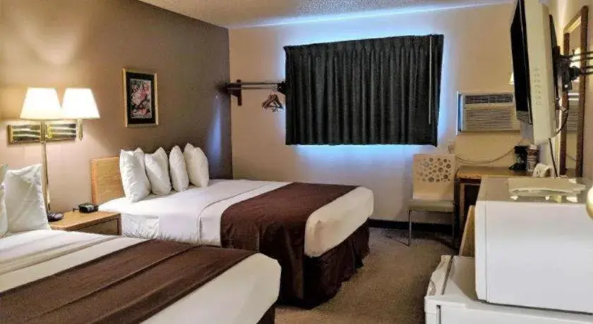 Bed in Americas Best Value Inn Torrington Bed in Americas Best Value Inn Torrington