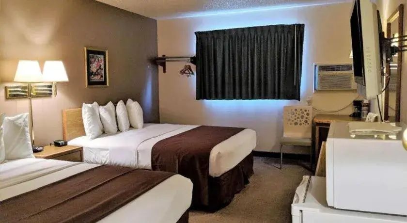 Bed in Americas Best Value Inn Torrington Bed in Americas Best Value Inn Torrington