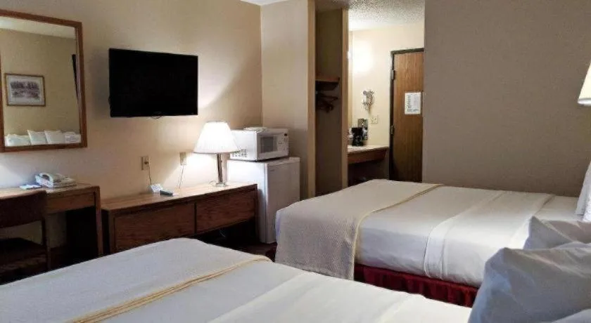 Bed in Americas Best Value Inn Torrington