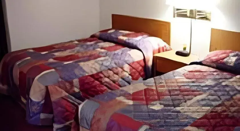 Bed in Americas Best Value Inn Torrington Bed in Americas Best Value Inn Torrington