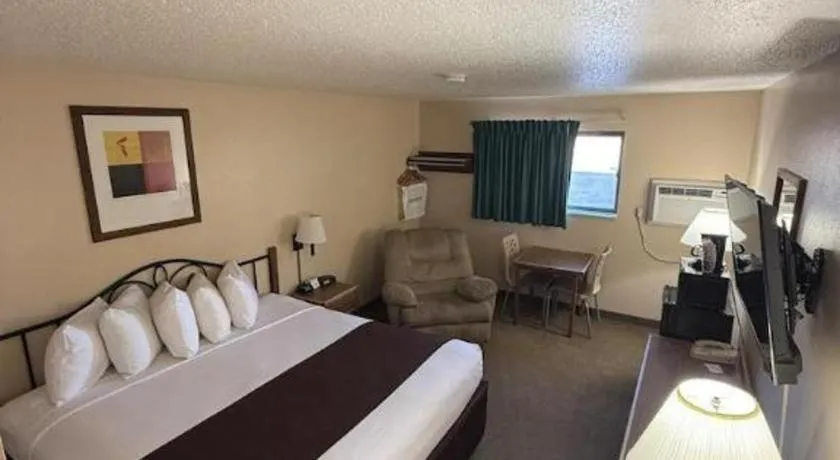 Bed in Americas Best Value Inn Torrington