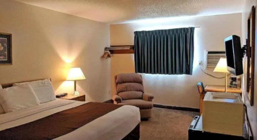 Bed in Americas Best Value Inn Torrington