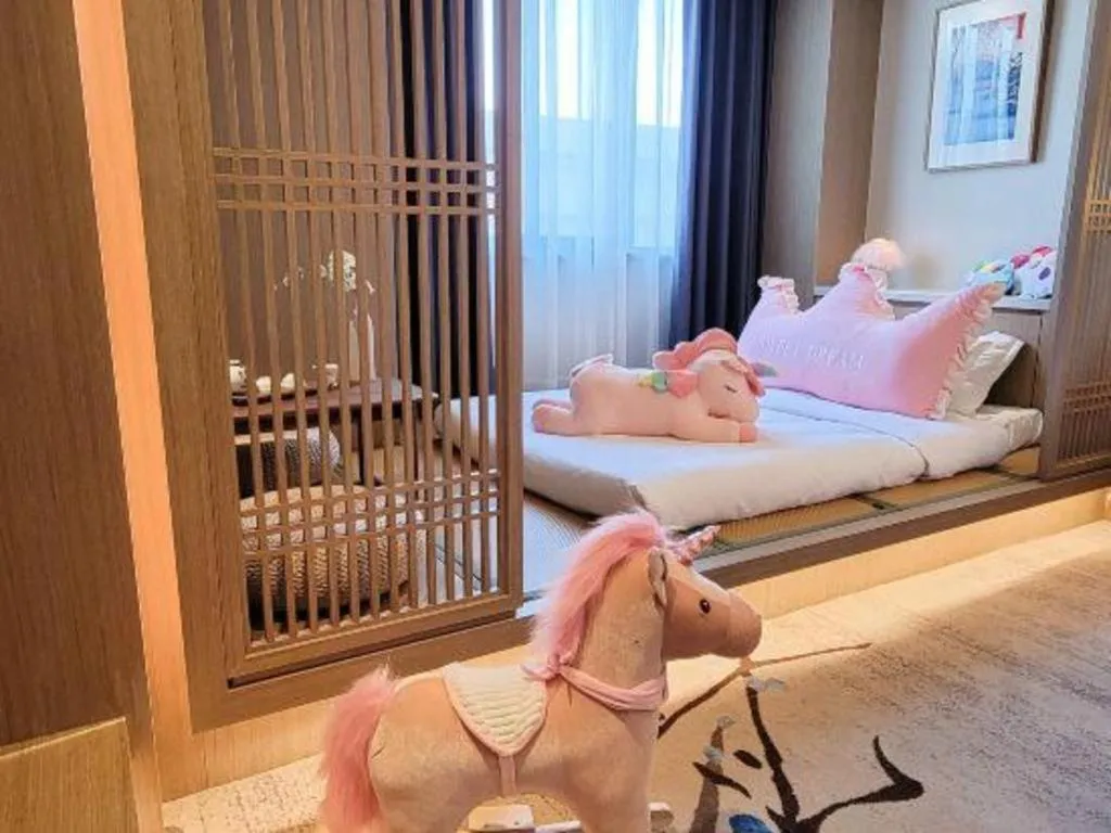 Bed in Hangzhou Blossom Hotel