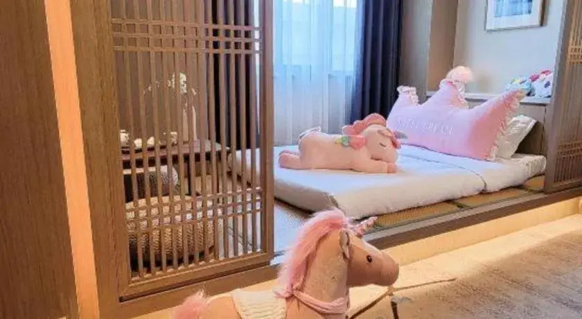 Bed in Hangzhou Blossom Hotel Bed in Hangzhou Blossom Hotel