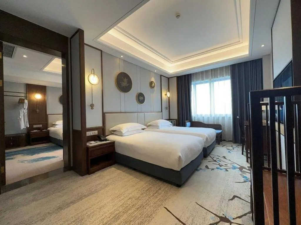 Bed in Hangzhou Blossom Hotel