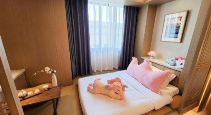 Bed in Hangzhou Blossom Hotel