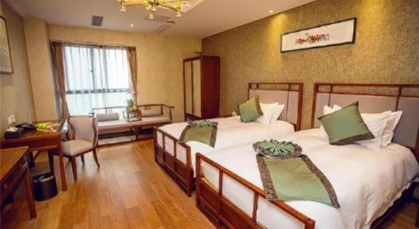 Bed in Hangzhou Blossom Hotel