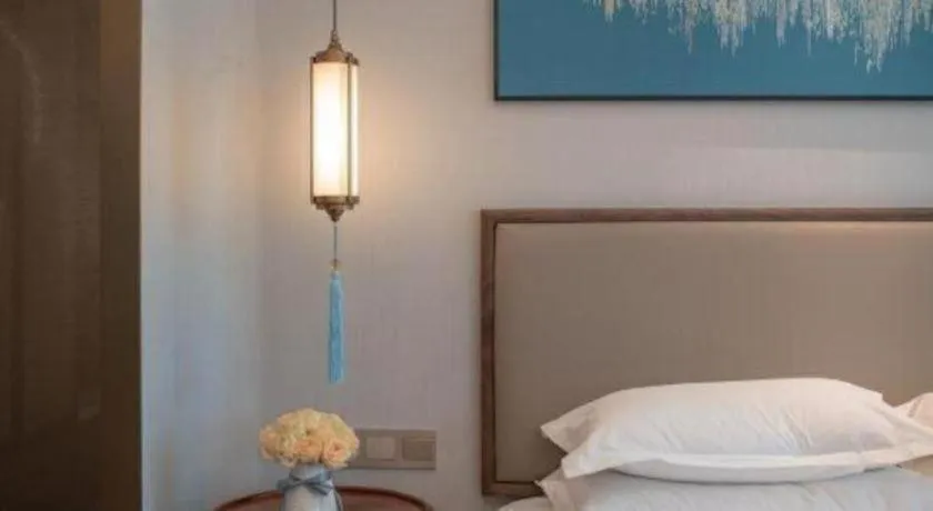 Bed in Hangzhou Blossom Hotel