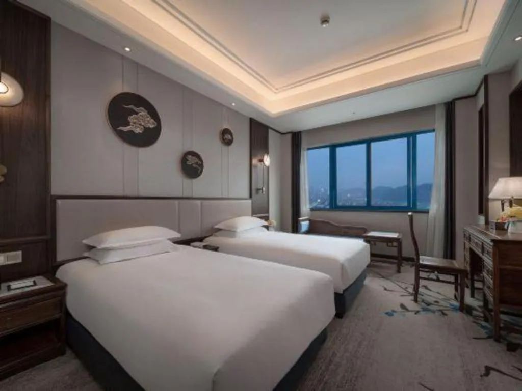 Bed in Hangzhou Blossom Hotel