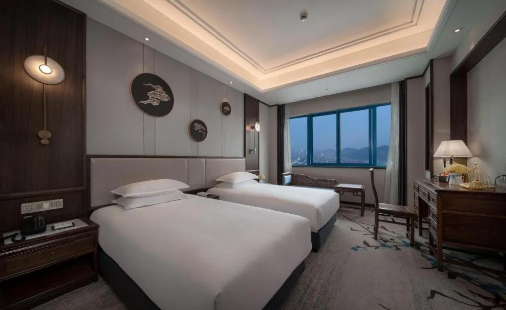 Bed in Hangzhou Blossom Hotel