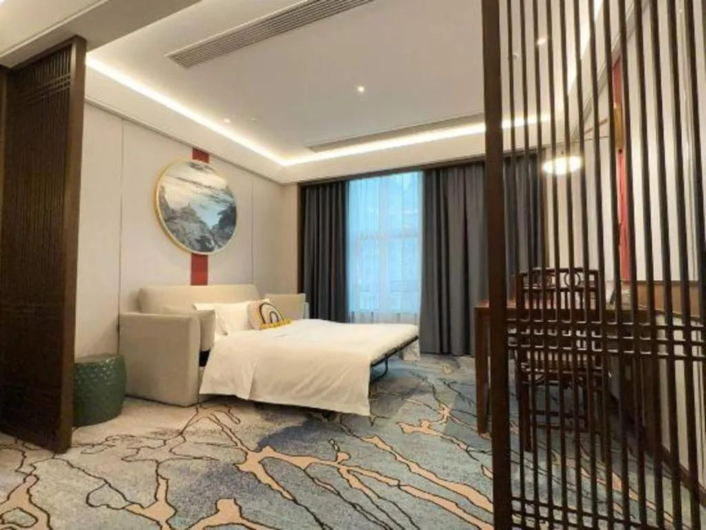 Bed in Hangzhou Blossom Hotel