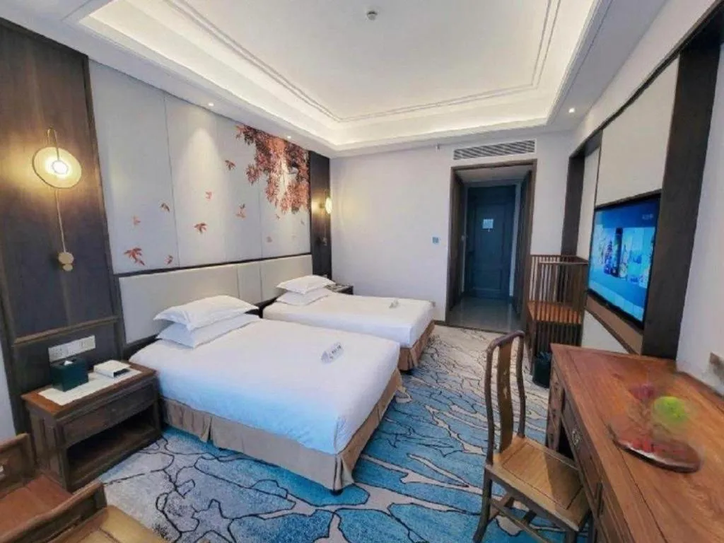 Bed in Hangzhou Blossom Hotel