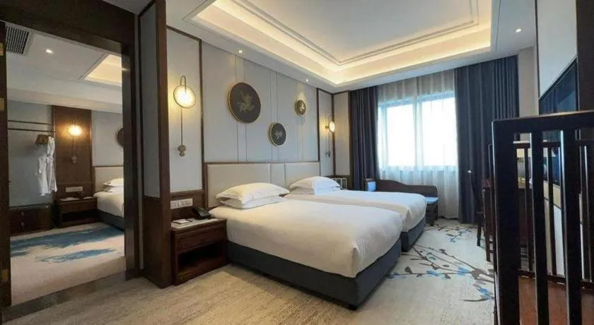 Bed in Hangzhou Blossom Hotel