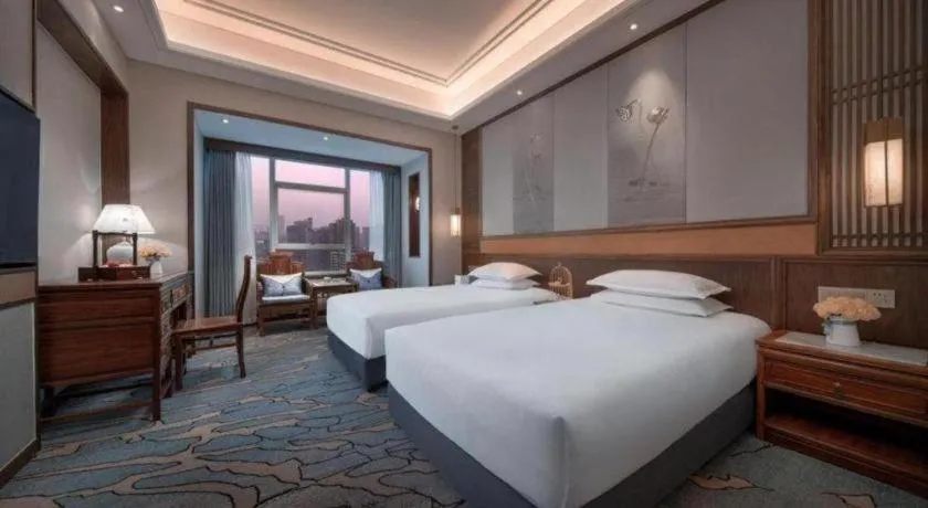 Bed in Hangzhou Blossom Hotel