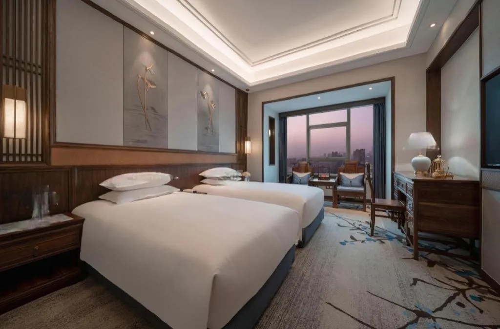 Bed in Hangzhou Blossom Hotel