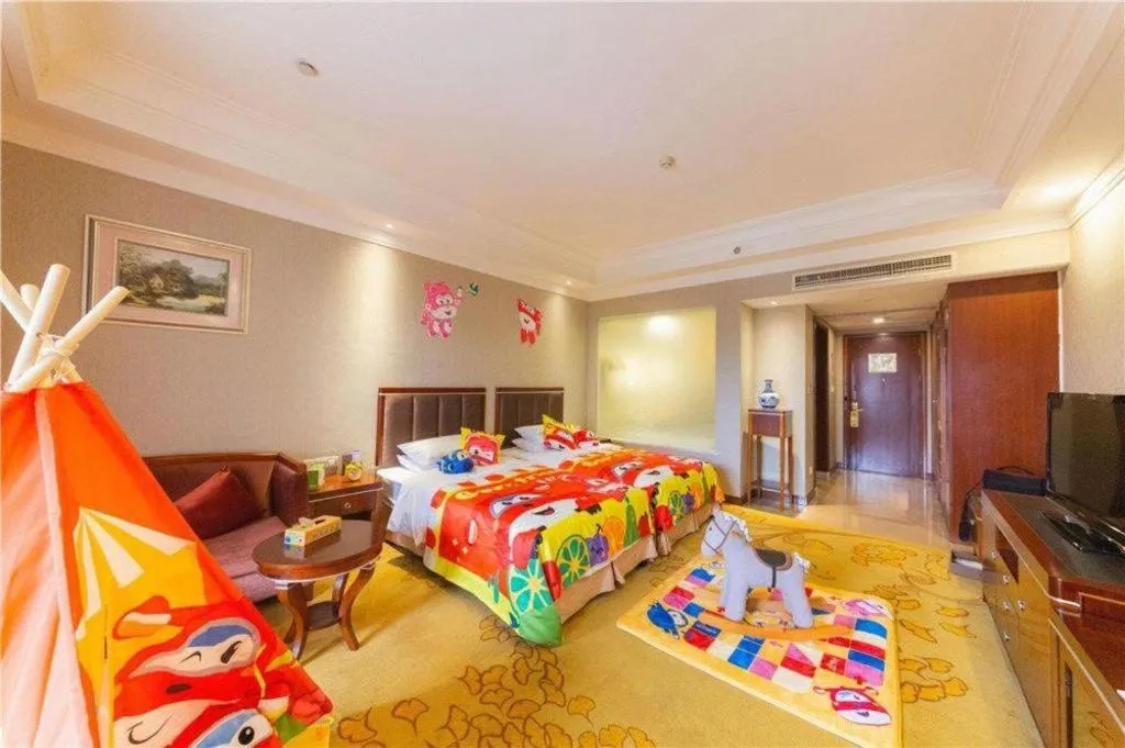 Bed in Xinjin Celebrity City Hotel