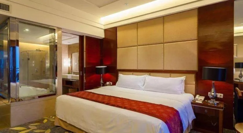 Bed in Xinjin Celebrity City Hotel