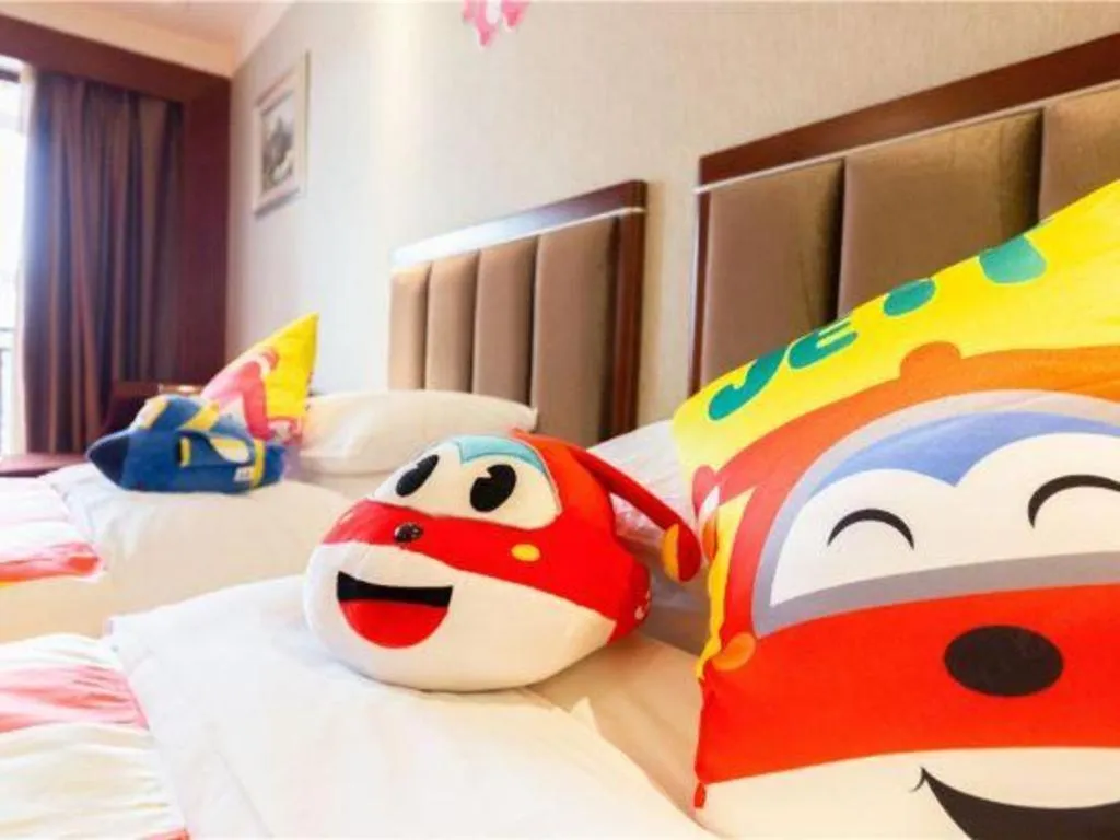 Bed in Xinjin Celebrity City Hotel