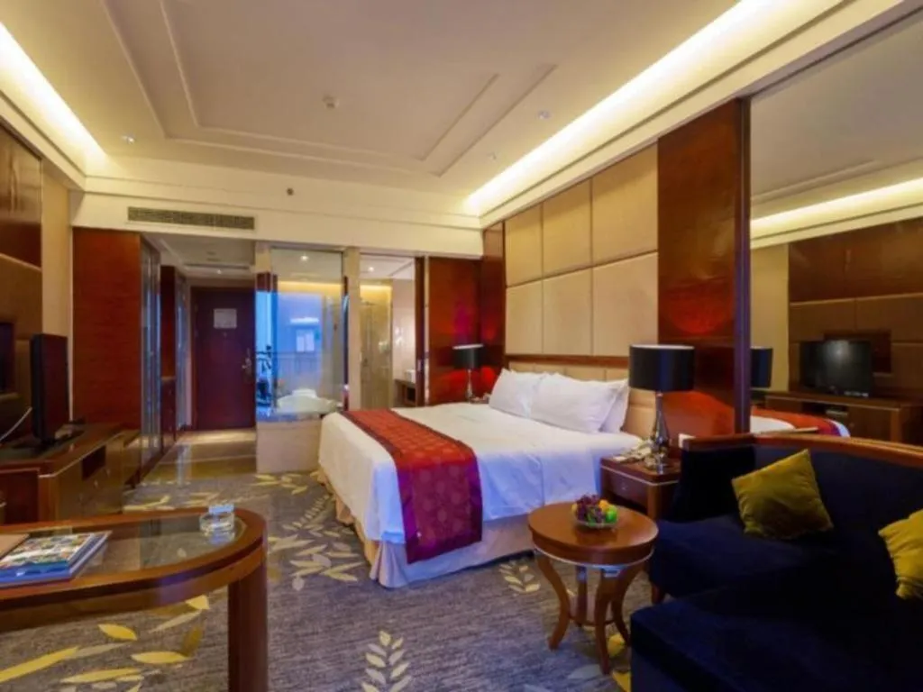 Bed in Xinjin Celebrity City Hotel