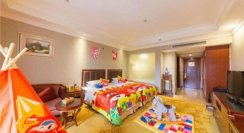 Bed in Xinjin Celebrity City Hotel