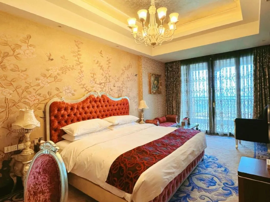 Bed in Xinjin Celebrity City Hotel