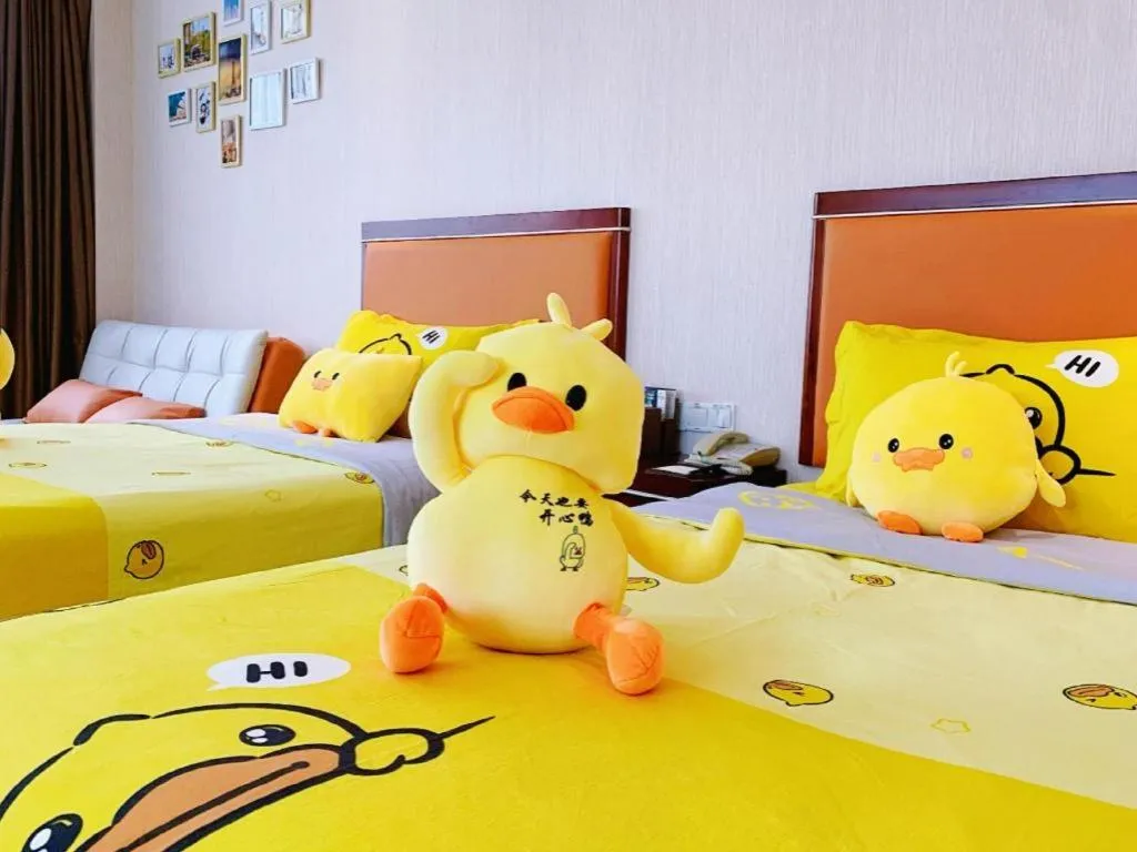 Bed in Xinjin Celebrity City Hotel