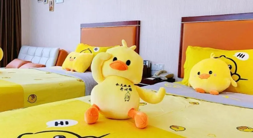 Bed in Xinjin Celebrity City Hotel