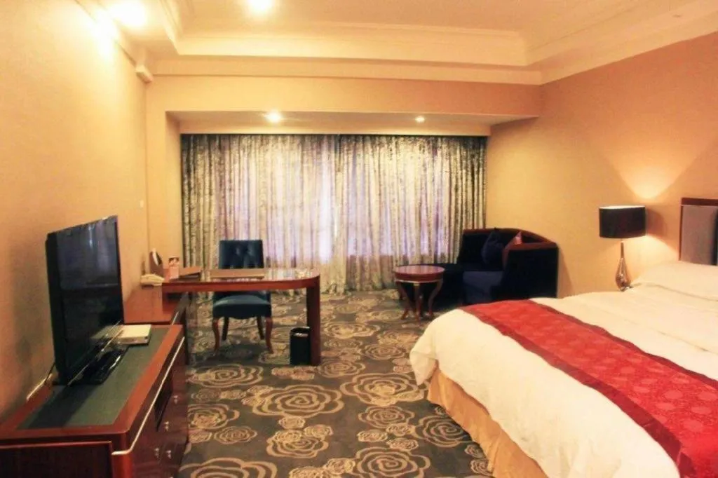 Bed in Xinjin Celebrity City Hotel