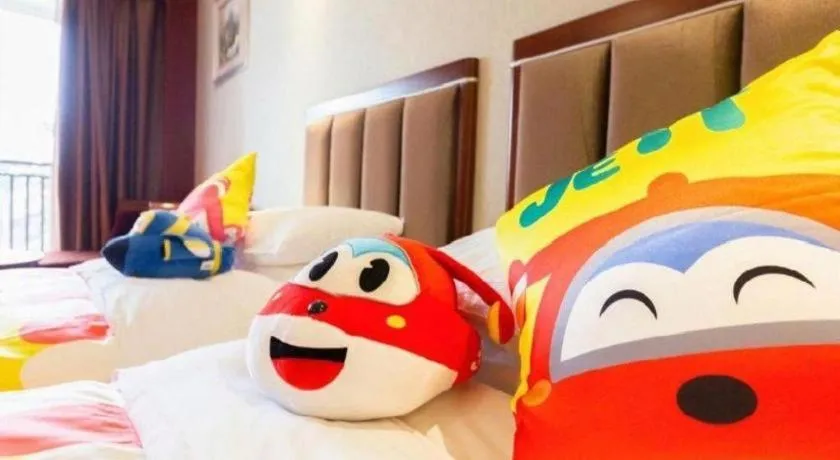 Bed in Xinjin Celebrity City Hotel