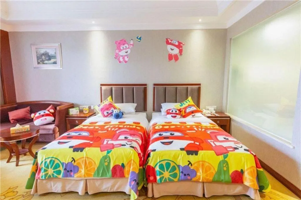 Bed in Xinjin Celebrity City Hotel