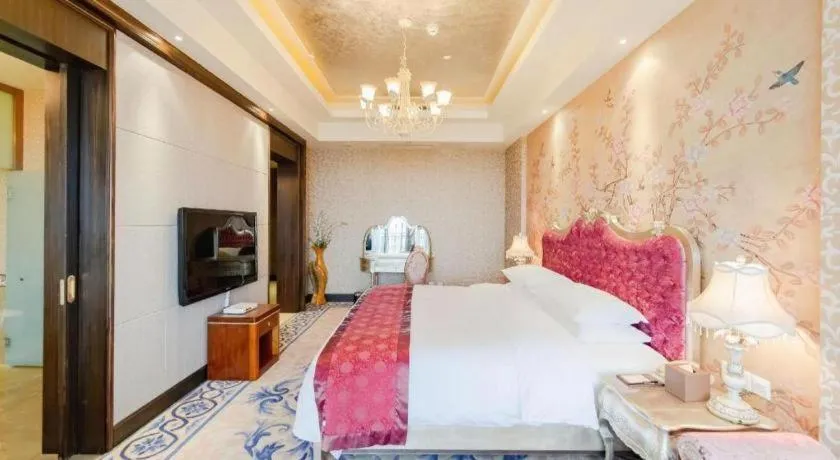 Bed in Xinjin Celebrity City Hotel