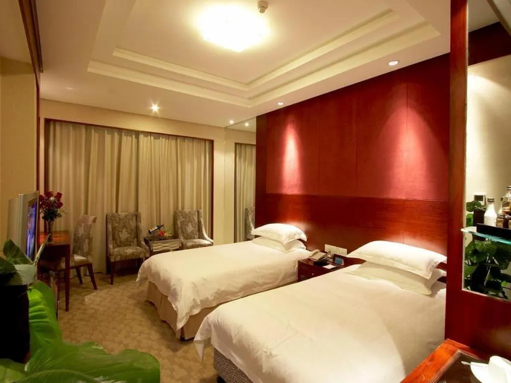 Bed in Huachen Kenzo Hotel Hangzhou