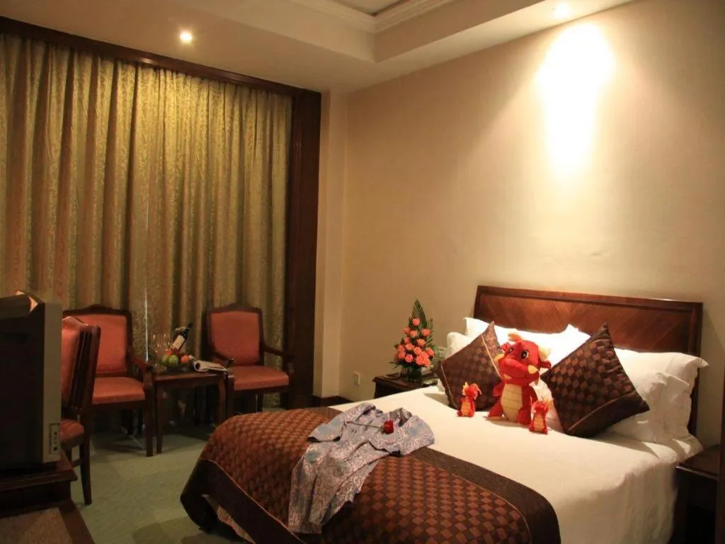 Bed in Huachen Kenzo Hotel Hangzhou