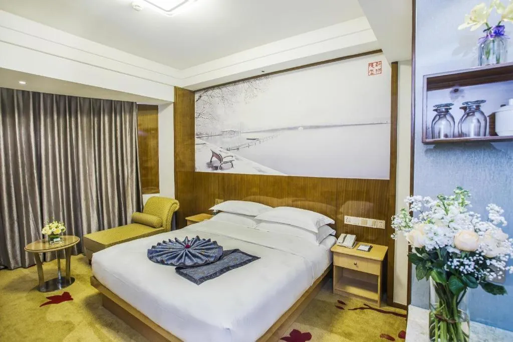 Bed in Huachen Kenzo Hotel Hangzhou