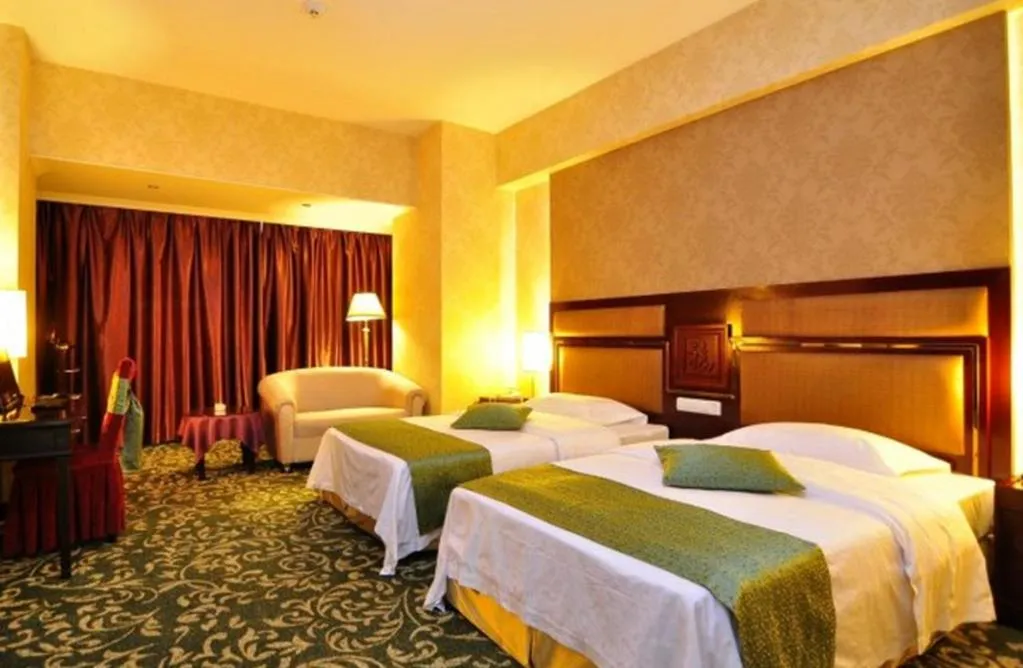 Bed in Economic Trade Hotel