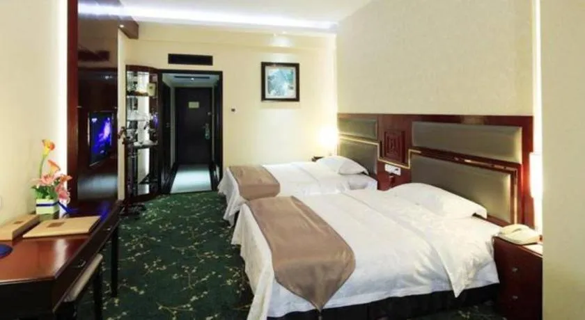 Bed in Economic Trade Hotel