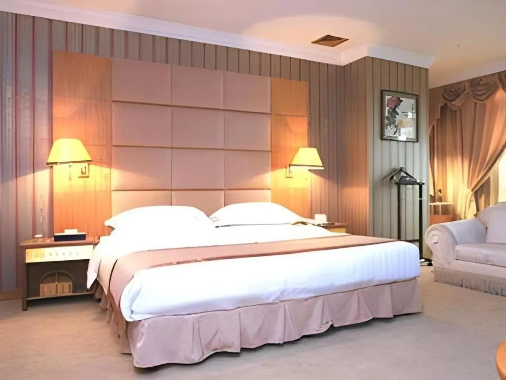 Bed in Economic Trade Hotel