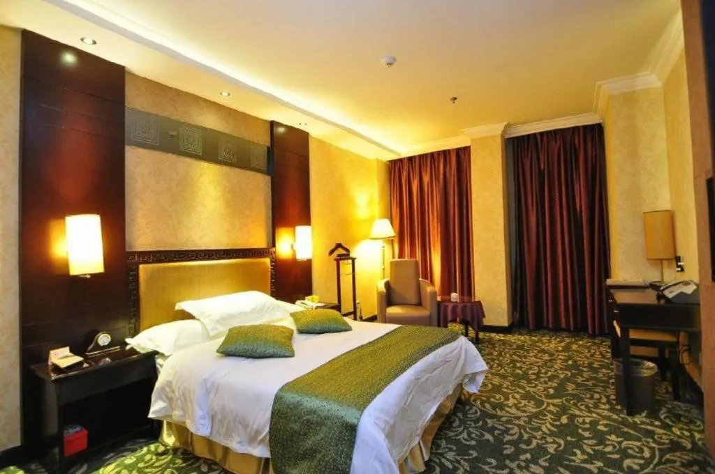 Bed in Economic Trade Hotel
