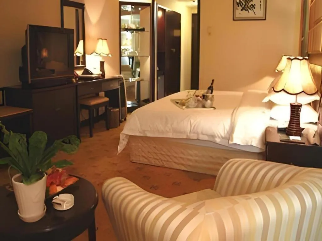 Bed in Economic Trade Hotel