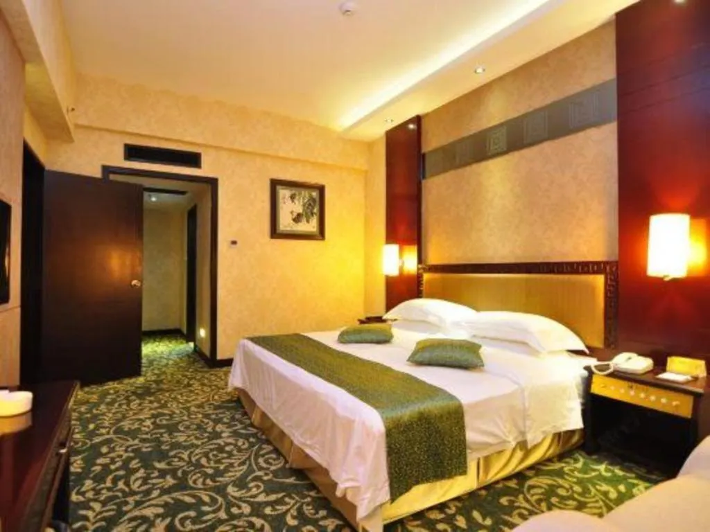 Bed in Economic Trade Hotel