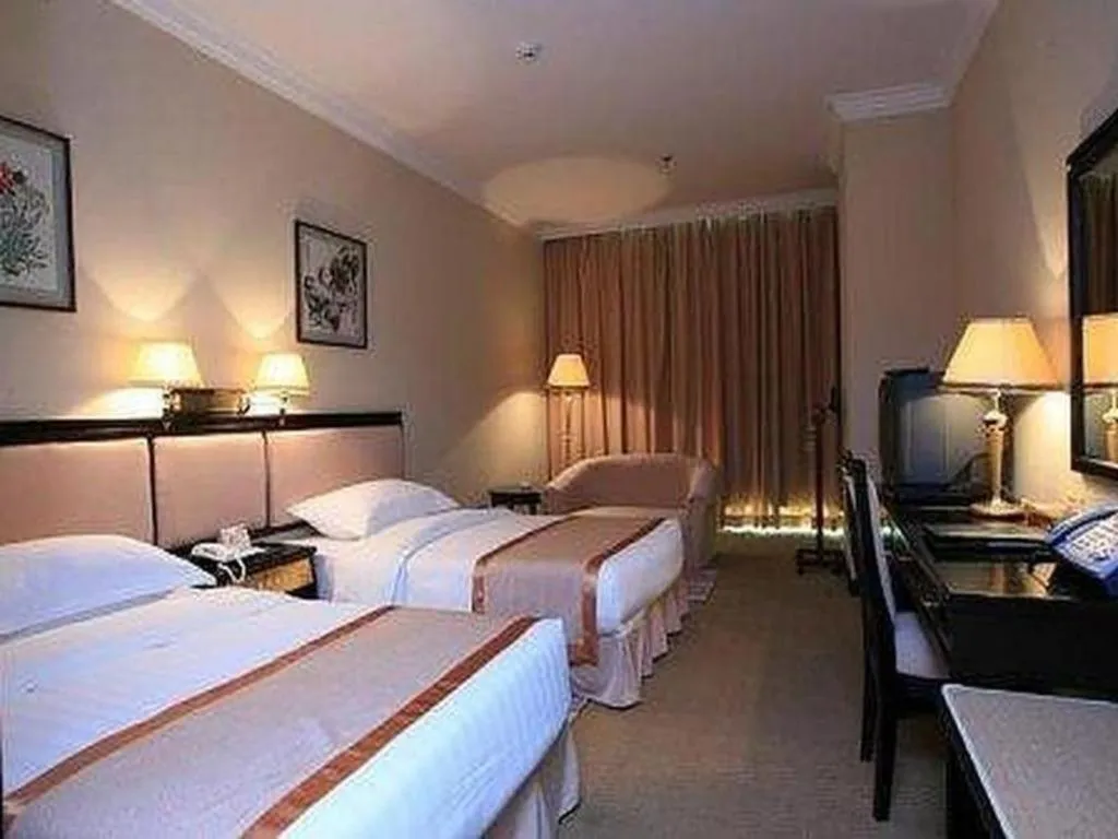 Bed in Economic Trade Hotel