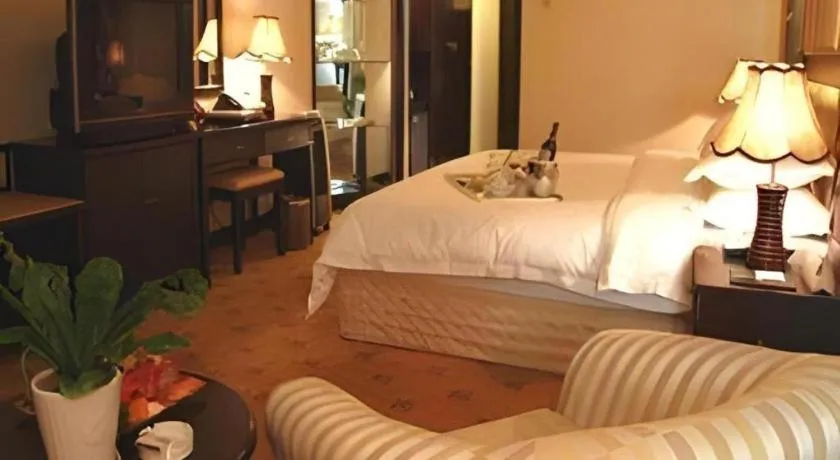 Bed in Economic Trade Hotel