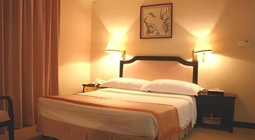 Bed in Economic Trade Hotel