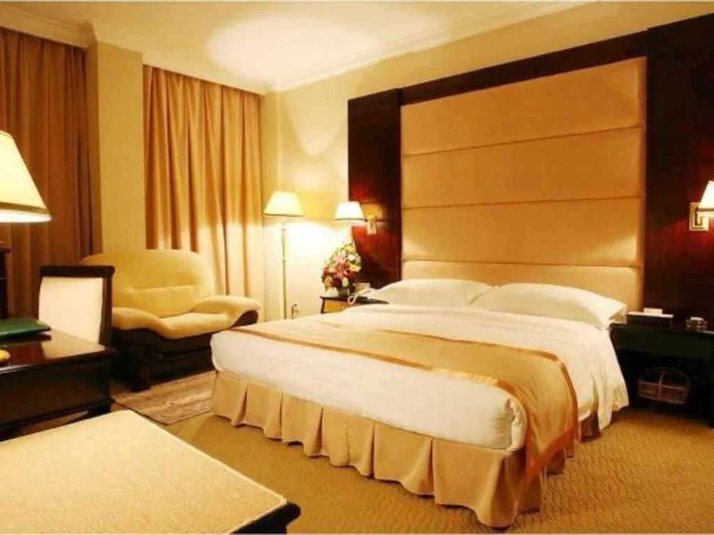 Bed in Economic Trade Hotel