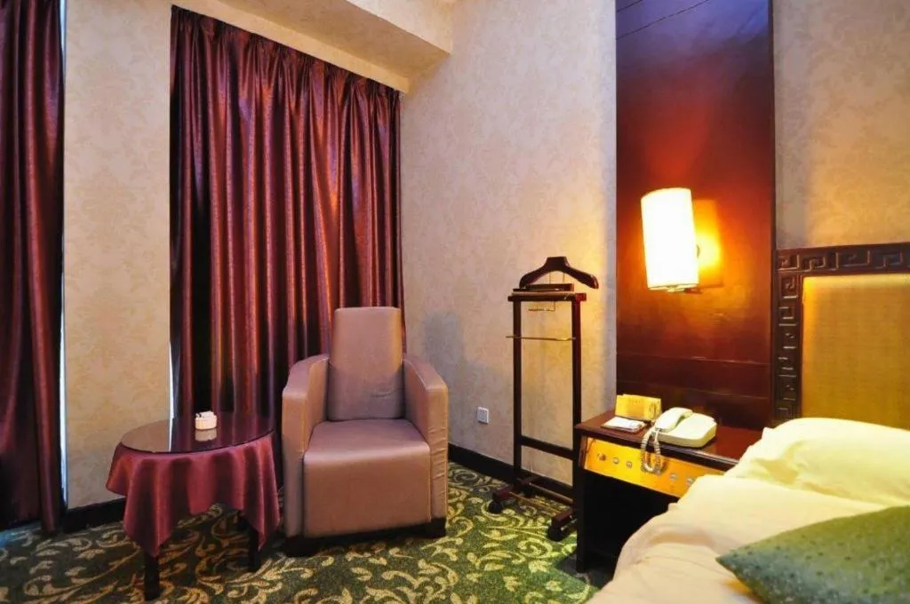 Bed in Economic Trade Hotel