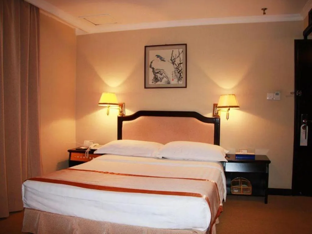 Bed in Economic Trade Hotel