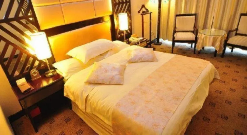 Bed in Economic Trade Hotel