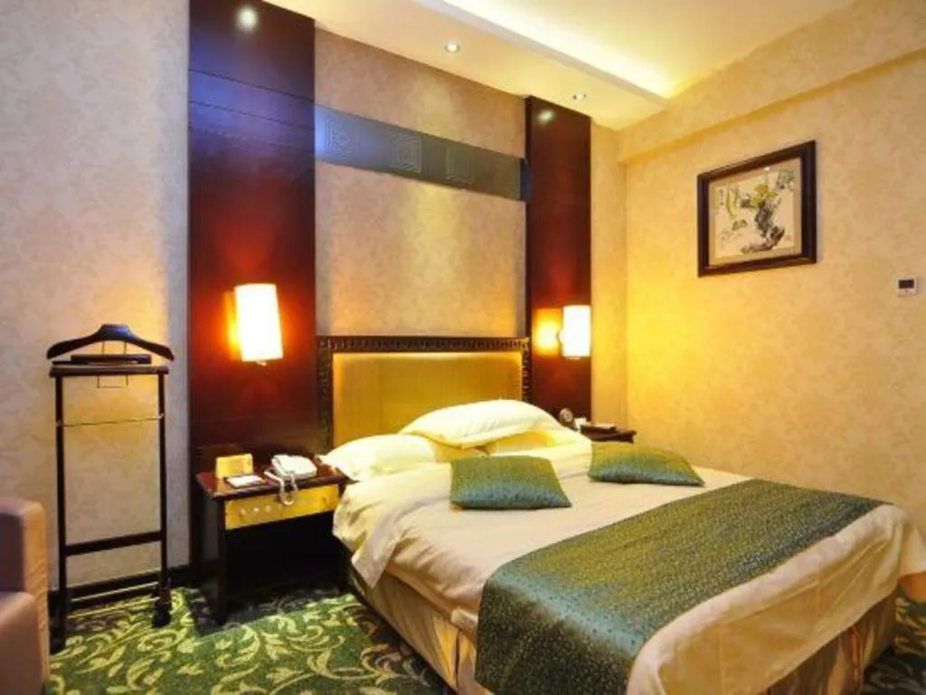Bed in Economic Trade Hotel