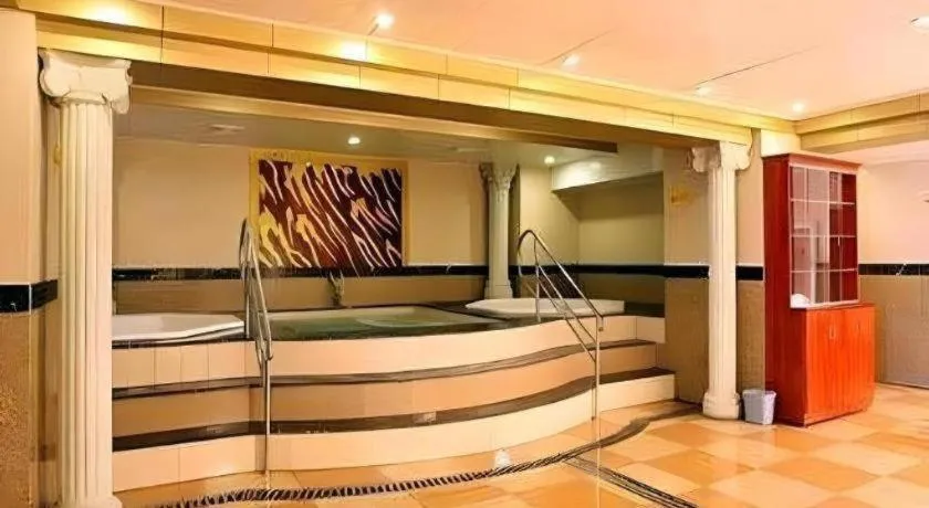 Bed in Economic Trade Hotel